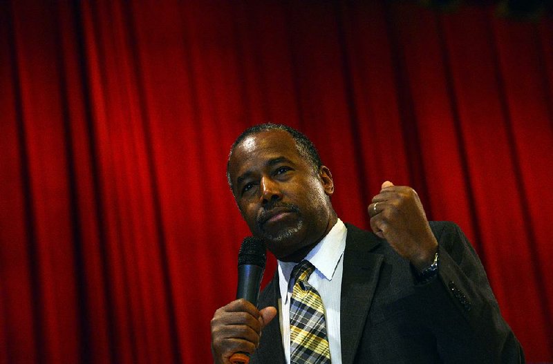 Republican presidential candidate and retired neurosurgeon Ben Carson speaks Sunday at Keene State College in Keene, N.H. Campaign manager Barry Bennett said Carson’s Iowa staff still has 35,000 firm commitments from Republicans who say they will attend caucuses on his behalf. 