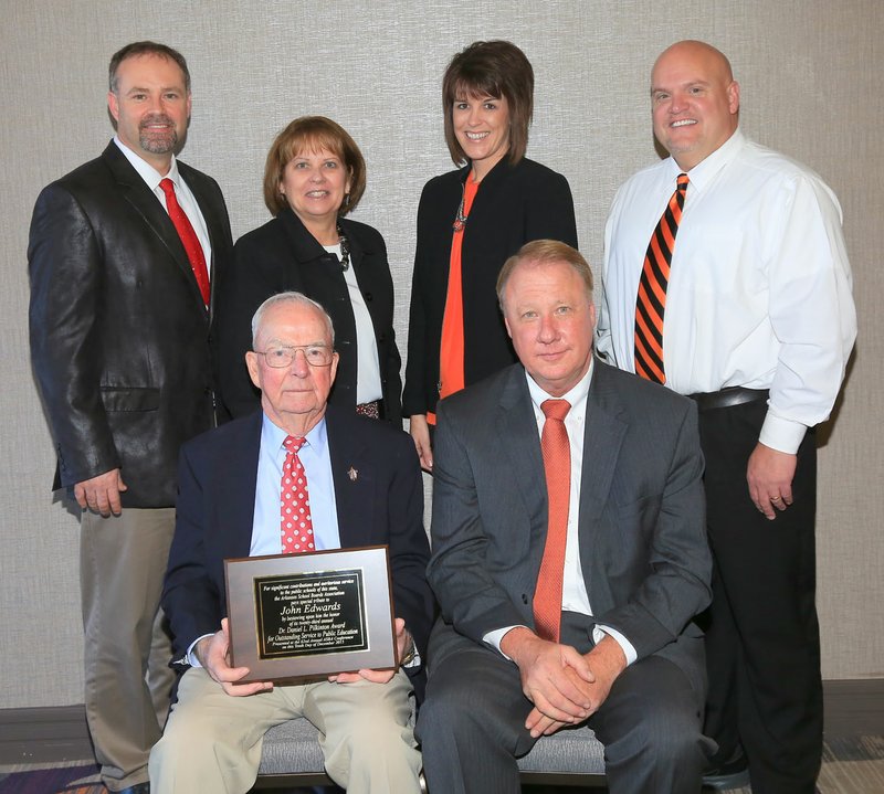 John Edwards was presented with the Dr. Daniel L. Pilkinton Award. He is pictured with Richard Page, Gravette School District superintendent; Zane Vanderpool, Glenn Duffy principal; Sharla Heltzel, special education director; Mandy Barrett, Gravette Upper Elementary principal; and Jay Chalk, Gravette High School principal.