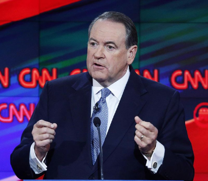 Mike Huckabee speaks during the CNN Republican presidential debate at the Venetian Hotel & Casino on Tuesday, Dec. 15, 2015, in Las Vegas. 