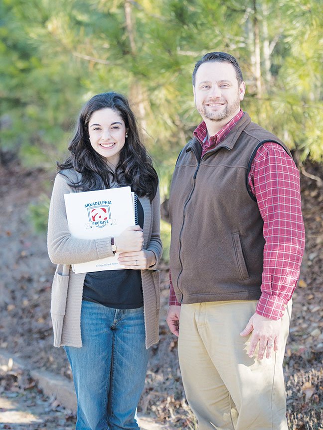 Addy Goodman, left, is among the Arkadelphia High School senior-class members who will benefit from the Arkadelphia Promise scholarship program. Addy, pictured here with Jayson Jones, Arkadelphia Promise executive director, plans to attend Ouachita Baptist University in Arkadelphia.