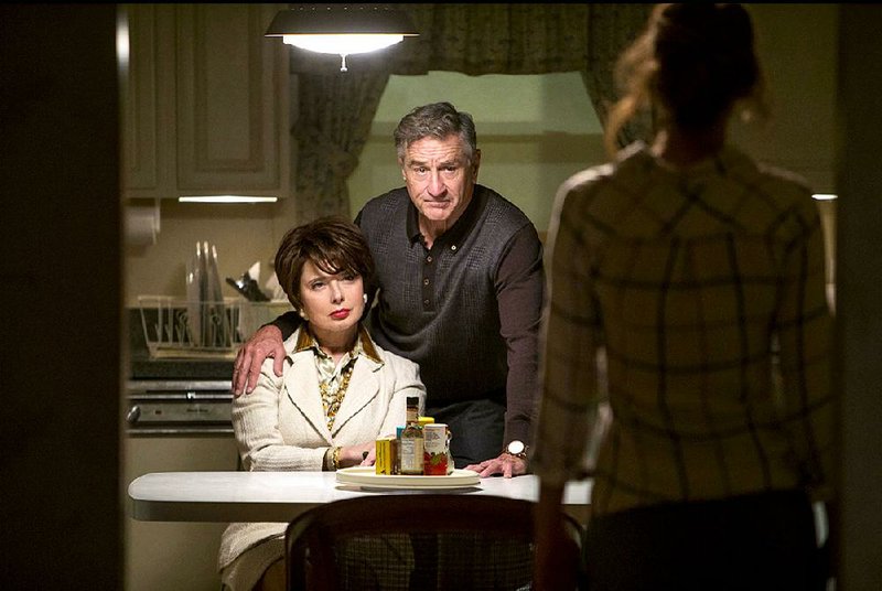 Trudy (Isabella Rossellini) and Rudy (Robert De Niro) are skeptical potential investors in Joy Mangano’s self-wringing Miracle Mop in David O. Russell’s Joy.