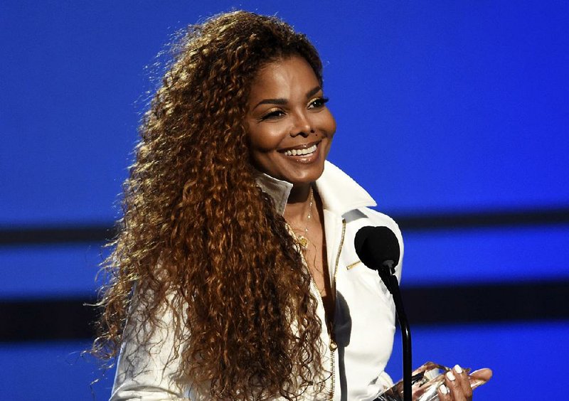 In this June 28, 2015, file photo, Janet Jackson accepts the ultimate icon: music dance visual award at the BET Awards in Los Angeles.