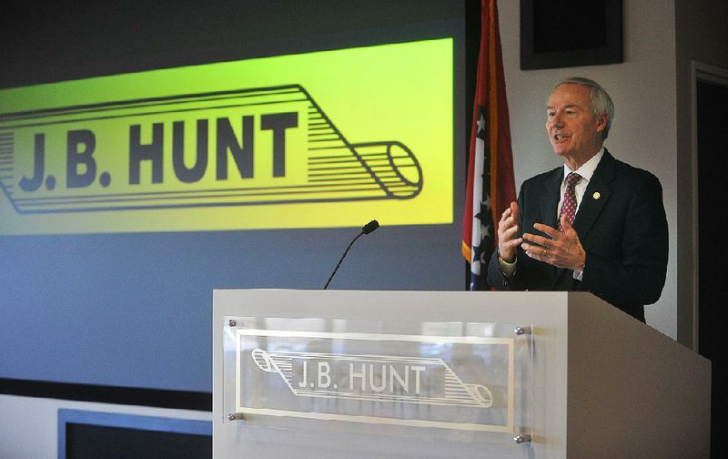 Asa Hutchinson, Governor of Arkansas, speaks during a press conference Wednesday December 9, 2015 at the J.B. Hunt Headquarters in Lowell as officials announce a major expansion to the facility that will create new jobs for the company.
