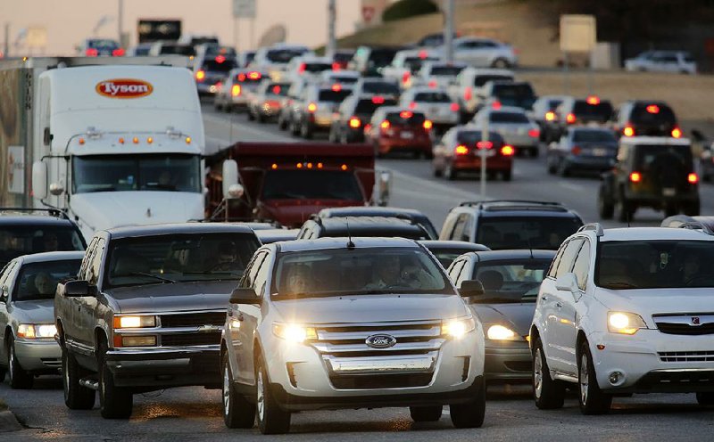 Traffic begins to back up on Dec. 3 at Joyce Boulevard and College Avenue in Fayetteville during rush hour.