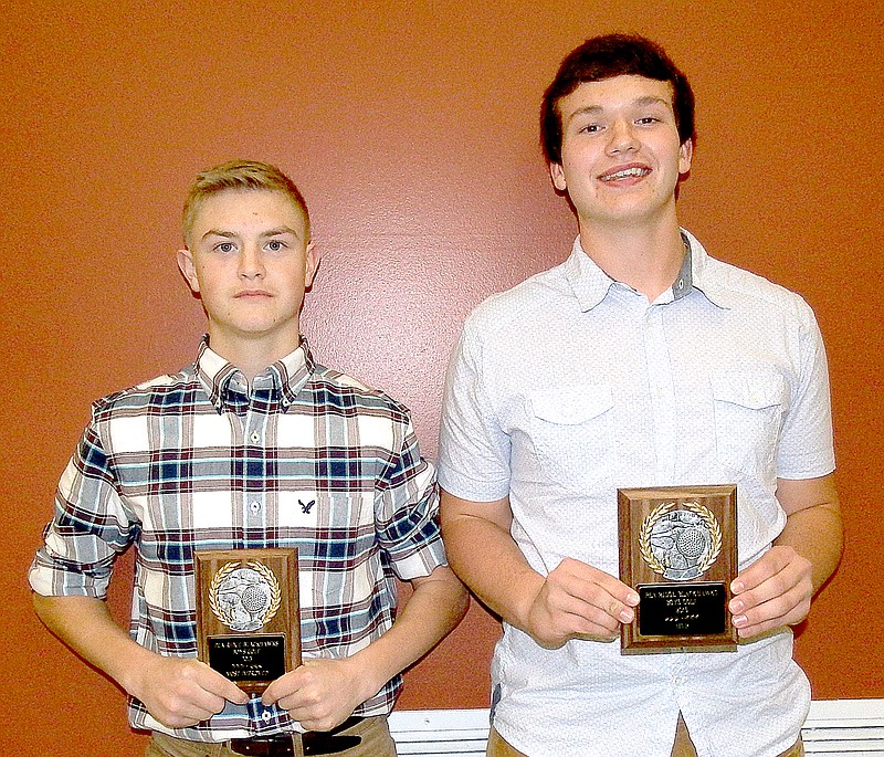 TIMES photographs by Annette Beard Blackhawk golfers Tyler Wallace (left) and Chandler Tidwell were awarded Mr. Clutch and Most Valuable Player, respectively, during the Fall Athletic Banquet. Both participated in the state meet. Other award winners were not present.