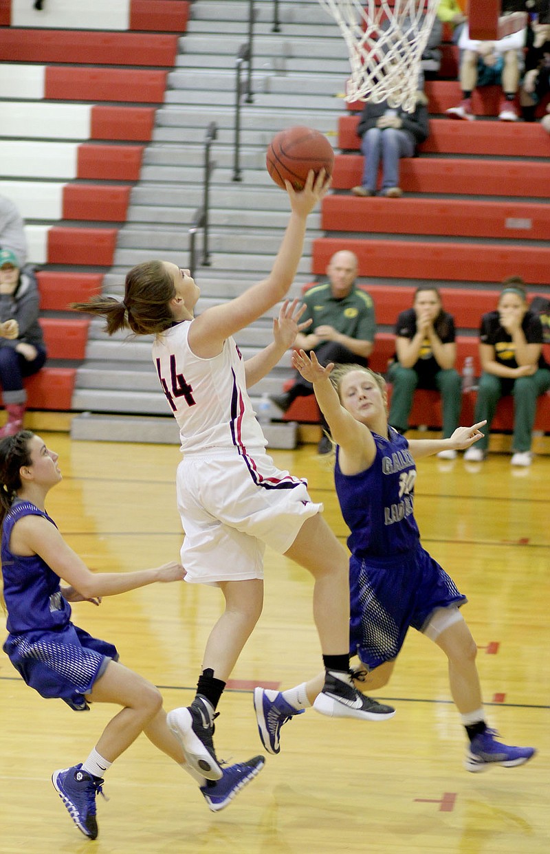 Lady Blackhawk Maggie Fletcher (No. 44) went in for a lay-up Monday in the gym at Southwest High School.