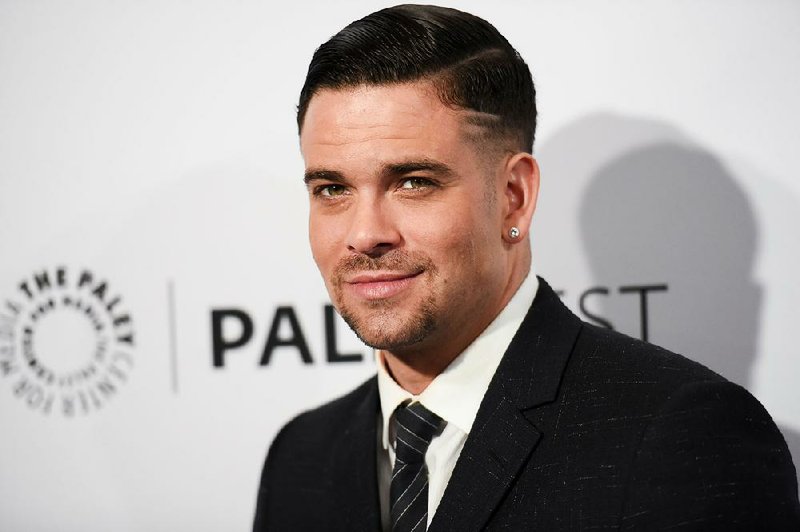 In this March 13, 2015 file photo, Mark Salling arrives at the 32nd Annual Paleyfest "Glee" held at The Dolby Theatre in Los Angeles. 