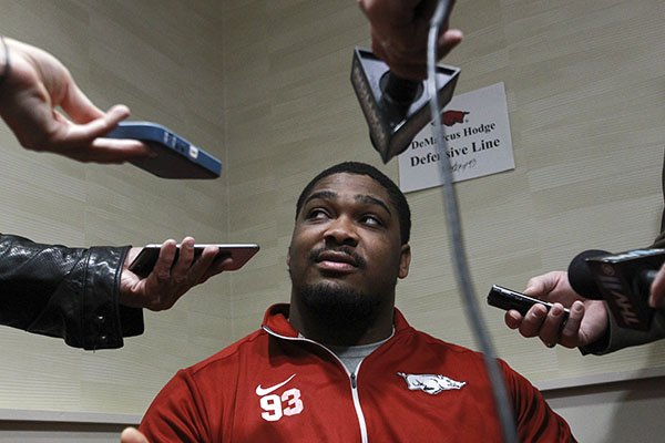 Arkansas defensive tackle DeMarcus Hodge answers questions Wednesday, Dec. 30, 2015, at Embassy Suites in Memphis, Tenn. 