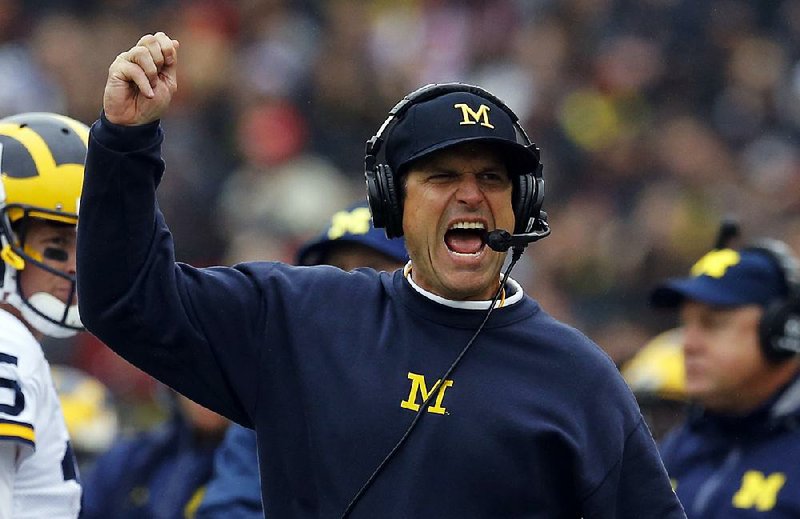 Michigan Coach Jim Harbaugh said on a talk show he would like to have WWE’s WrestleMania come to Michigan Stadium, adding that the event could draw 140,000 fans. 