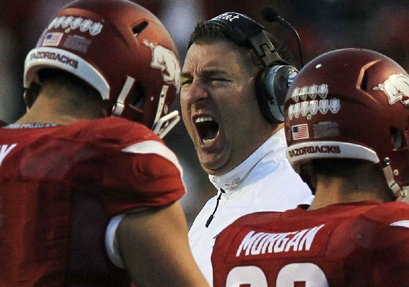 Arkansas Democrat-Gazette/BENJAMIN KRAIN --10/18/2014--
Bret Bielema gets upset with a penalty call during the fourth quarter of the Razorbacks 32-45 loss at War Memorial Stadium