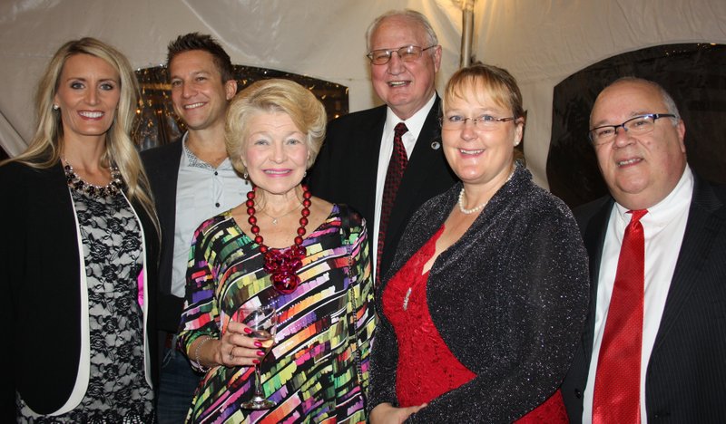 Jennifer and Craig Grimes (from left), Janet and Jimm Hendren and Corinna and Alan Dranow attend the Christmas Gala at the Peel Mansion on Dec. 12 in Bentonville.