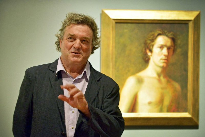 Jamie Wyeth stands in front of his 1969 self-portrait during the opening of “Jamie Wyeth” at Crystal Bridges Museum of American Art.
