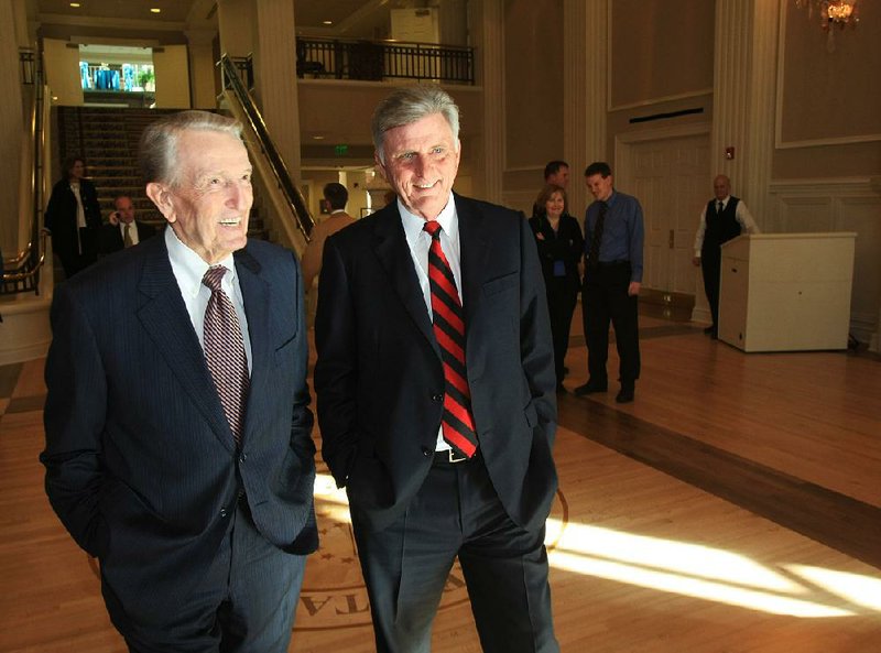 Dale Bumpers visits with then-Gov. Mike Beebe at the Governor’s Mansion on Jan. 7, 2011, before an event for the release of a book about the mansion.