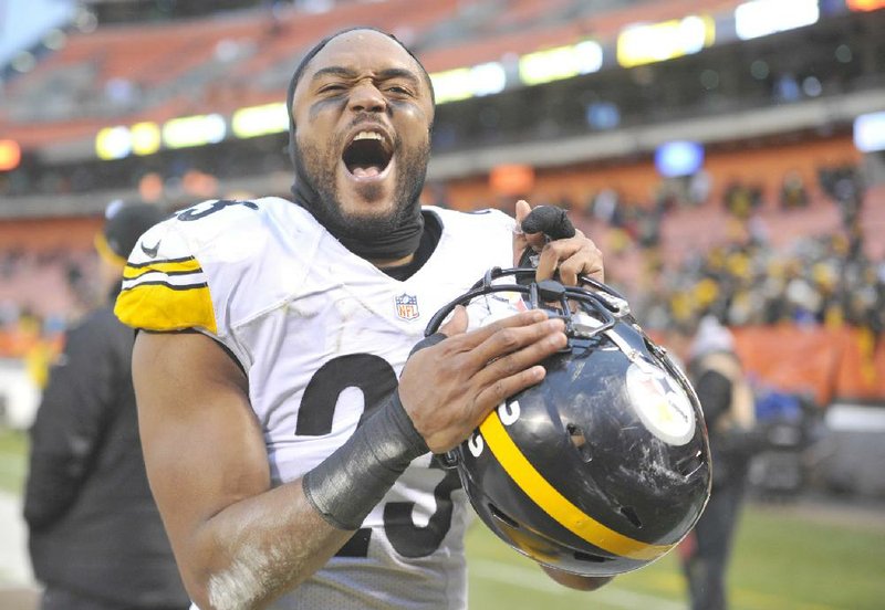 Pittsburgh Steelers free safety Mike Mitchell celebrates after the Steelers defeated the Cleveland Browns 28-12 Sunday in Cleveland. With the victory, and a little help from the Buffalo Bills, the Steelers earned an AFC playoff berth.

