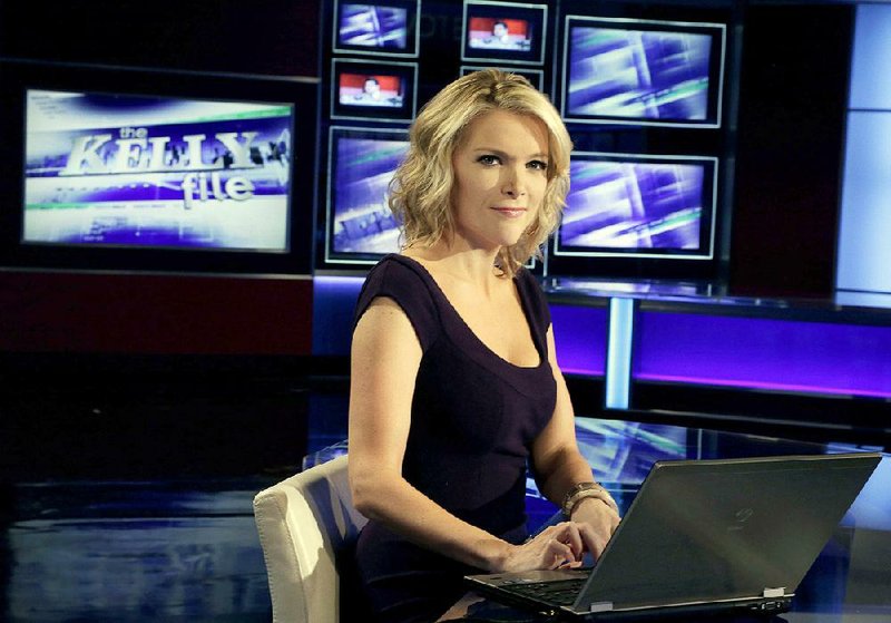Megyn Kelly, host of Fox News Channel's "The Kelly Files,"  poses for a photo as she rehearses for the debut of her new prime-time show, in New York, Friday, Oct. 4, 2013. Her program is the linchpin to the first overhaul of Fox's prime-time lineup since 2002, or about a century in television time. (AP Photo/Richard Drew)
