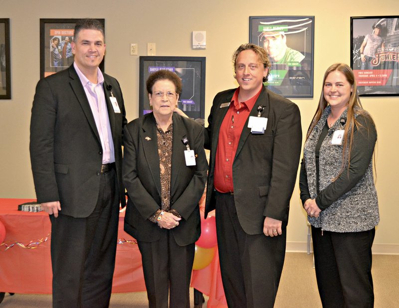 Photo submitted Cherokee Casino &amp; Hotel West Siloam Springs staff Tony Nagy, general manager; Wanda Rogers, cage operations shift manager; Robbie Farmer, cage shift manager; and Nena Osbourn, cage operations trainer celebrate more than 21 years of service by Rogers at her retirement party. She began her career at Cherokee Nation Entertainment in early 1994.