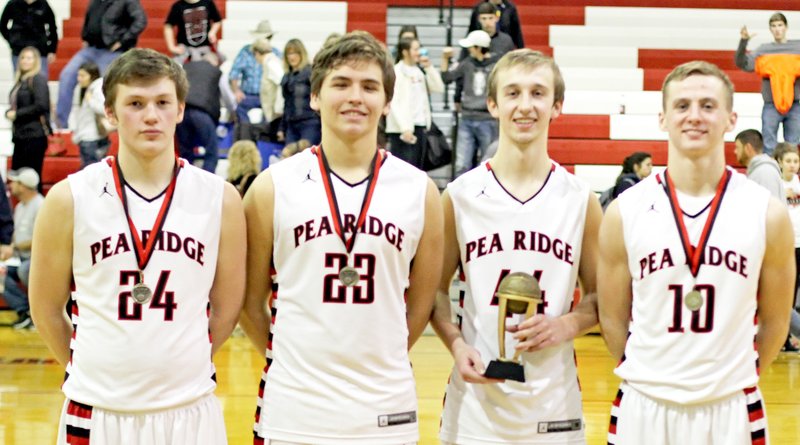 Photographs by Russ Wilson Joey Hall (third from left) with 30 points for the Blackhawks (11-3) and was named the tournament&#8217;s most valuable player. Westin Church, Britton Caudill and Cole Wright were named to the All-Tournament team. Editor&#8217;s note: Wilson Creations at 479-633-1365 or its2ez4me2hr@yahoo.com. Check out Wilson Creations on Facebook at www.facebook.com/wilsoncreations or visit his Web site at www.wilsoncreations.com.