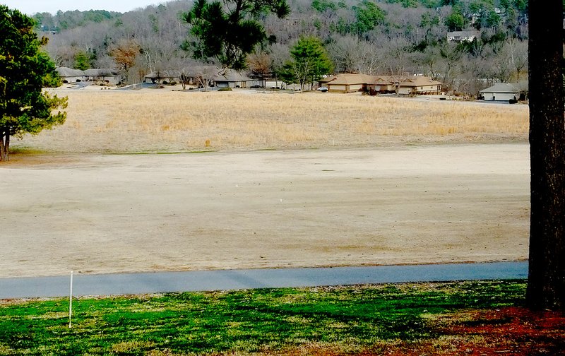 Tom A. Throne/The Weekly Vista The dark tan area in the upper center of the photo is the proposed area for a planned zoning district by Cooper Homes Inc. The 24-acre site would call for 48 homes during the plans being consider by the Bella Vista Planning Commission.