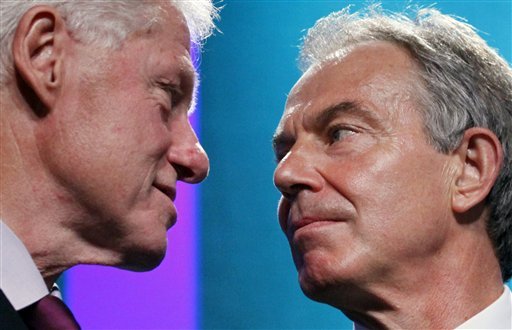 Former U.S. President Bill Clinton (left) and former Prime Minister of the United Kingdom Tony Blair talk Sept. 22, 2010, at the Clinton Global Initiative in New York. 