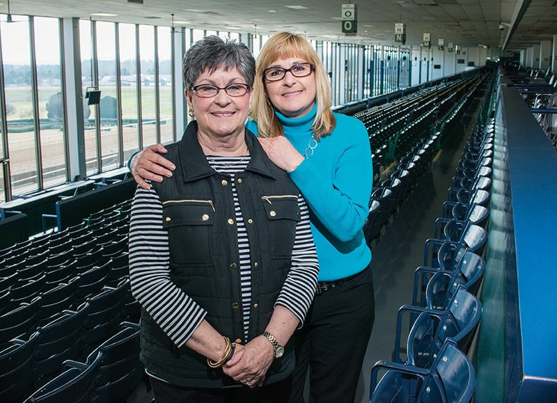 Alta Mullenix, left, and her daughter, Pam Mullenix, are longtime employees at Oaklawn Park. Alta works in the reserved-seats office, and Pam is the facility coordinator.