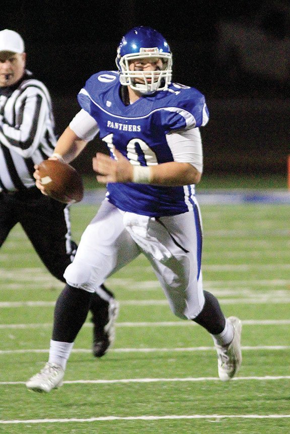 Greenbrier quarterback Harold Ross scrambles during the Panthers’ win over Beebe in the first round of the Class 5A state playoffs in November. Ross threw 25 touchdown passes during the 2015 season.