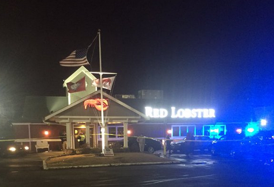 Little Rock police investigate Saturday, Jan. 9, 2016, after an officer-involved shooting at Red Lobster, 8407 W. Markham St.
