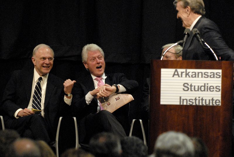 David Pryor (left) and Bill Clinton (center) share a laugh with Dale Bumpers at the opening ceremony of the Arkansas Studies Institute in 2009.