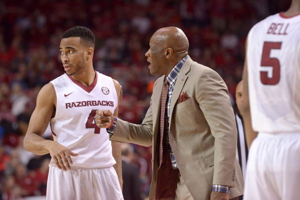 Arkansas coach Mike Anderson talks with Jabril Durham on Saturday, Jan. 9, 2016, during the game against Mississippi State in Bud Walton Arena in Fayetteville. 