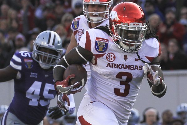 Arkansas running back Alex Collins ran 185 yards and three touchdowns during the Razorbacks' 45-23 Liberty Bowl victory over Kansas State Saturday, Jan. 2, 2016, in Memphis.