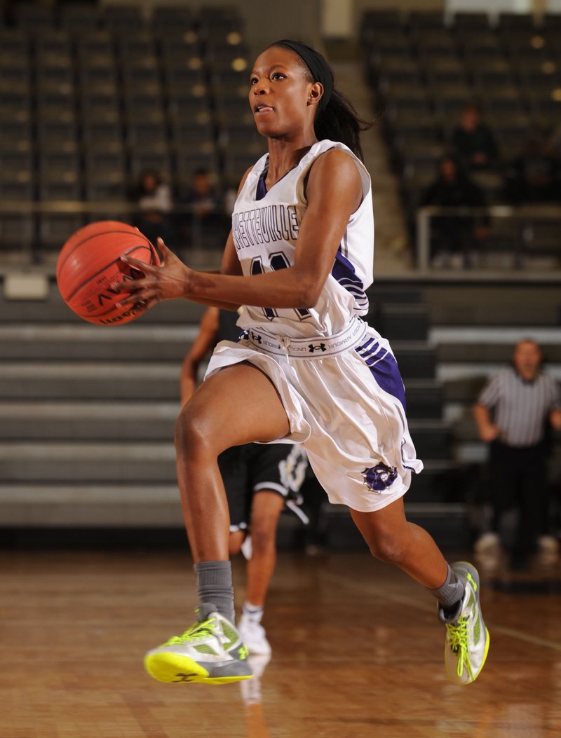 Pink Jones of Fayetteville drives to the basket against Little Rock Central Saturday, Dec. 12, 2015, during the first half at Bulldog Arena. Visit nwadg.com/photos to see more photographs from the game.