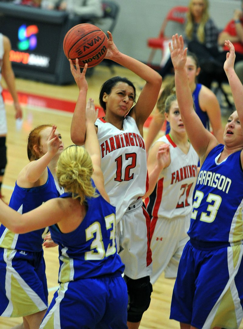 Kayla Brown (12) Farmington forward, is fouled as she tries to drive to the hoop past Harrison defenders Briley Due (33) and Emily Harp (23) Tuesday January 12, 2016 during their game at Cardinal Arena in Farmington.
