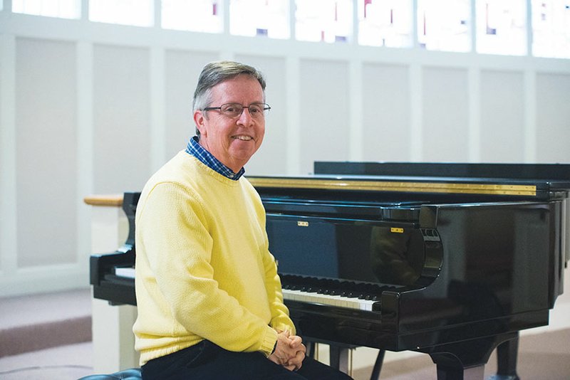 Tim Gunter, who started this week as the new Central Baptist College director of bands, sits at a piano on the Conway campus. The college, which hasn’t had a band for several years, will launch a band program this fall. Gunter will create the program from scratch, including ordering instruments and music. He is a former director of athletic bands at the University of Arkansas at Fayetteville, and under his leadership, the Razorback Marching Band won the Sudler Trophy.