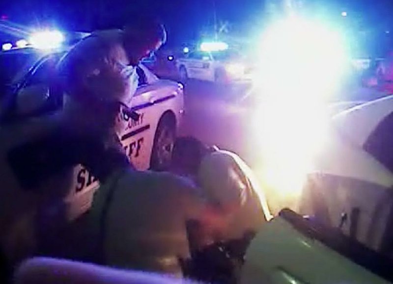 This video shows Faulkner County sheriff’s deputies detaining Harvey Martin III after a high-speed chase May 4 that involved gunfire. 