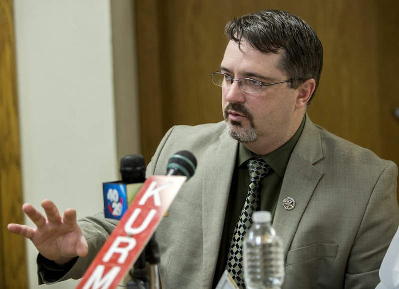 NWA Democrat-Gazette/JASON IVESTER
Benton County Sheriff Kelley Cradduck speaks on Wednesday, Jan. 13, 2016, during a news conference at KURM radio in Rogers. Cradduck addressed grievance filed against him as sheriff.