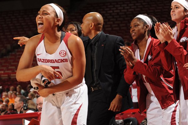 Arkansas' Kelsey Brooks (left) celebrates on the bench against Tennessee Thursday, Jan. 14, 2016, during the second half in Bud Walton Arena in Fayetteville.