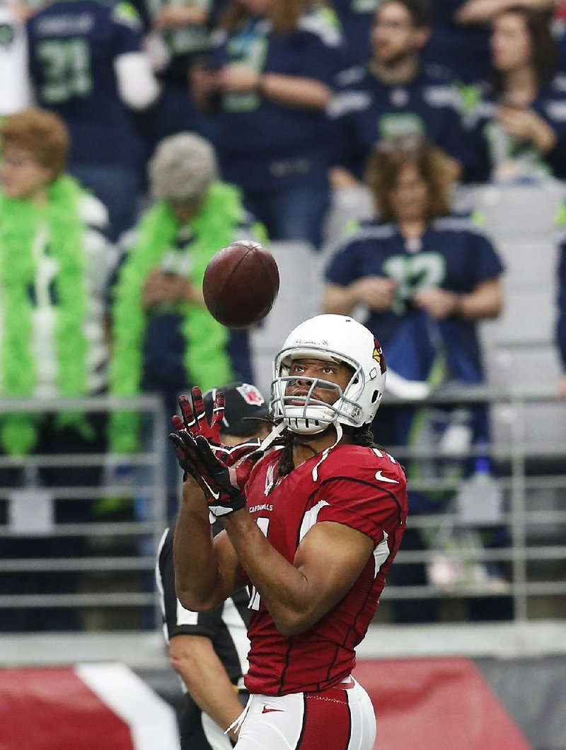 Arizona Cardinals wide receiver Larry Fitzgerald chooses not to talk trash on the field; he would rather talk nice.