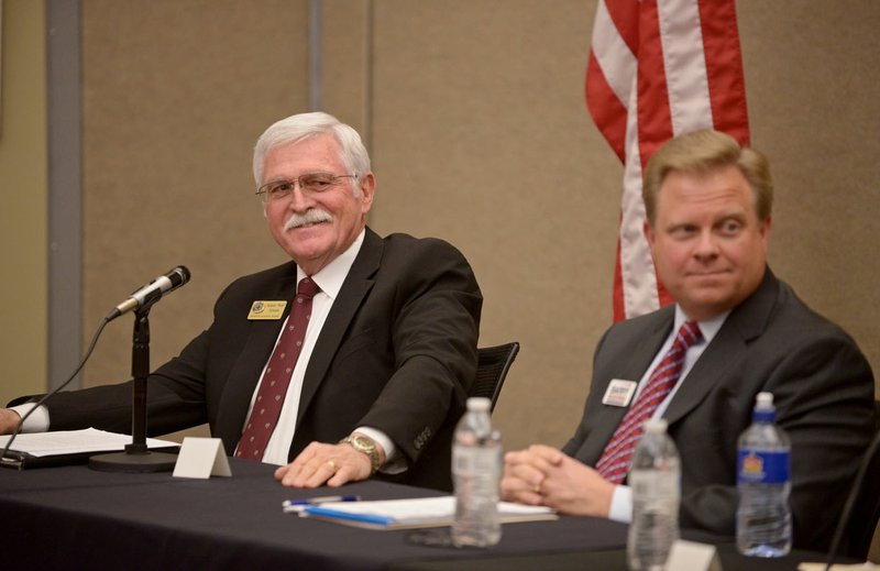 Benton County Judge Bob Clinard (left) and primary challenger Justice of the Peace Barry Moehring participate Thursday in a forum for Republican candidates at Northwest Arkansas Community College in Bentonville.