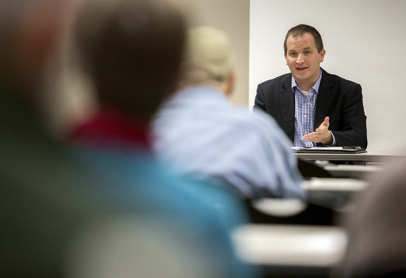 Trevor Timberlake, engineer supervisor with Arkansas Natural Resources Commission, speaks Thursday during a public hearing in Bentonville on the dam at Lake Bella Vista.