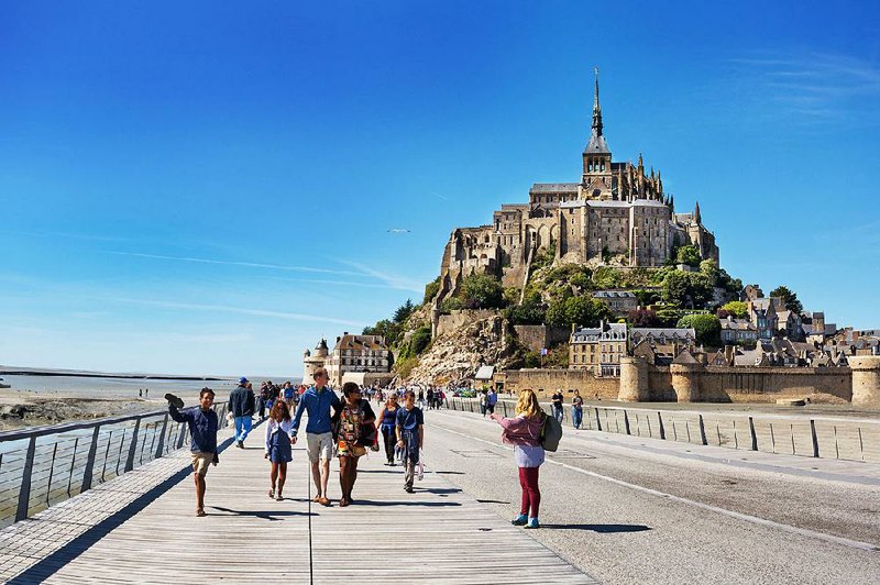 Hydraulic work around Mont-St-Michel is complete, making it an island at high tide once again.