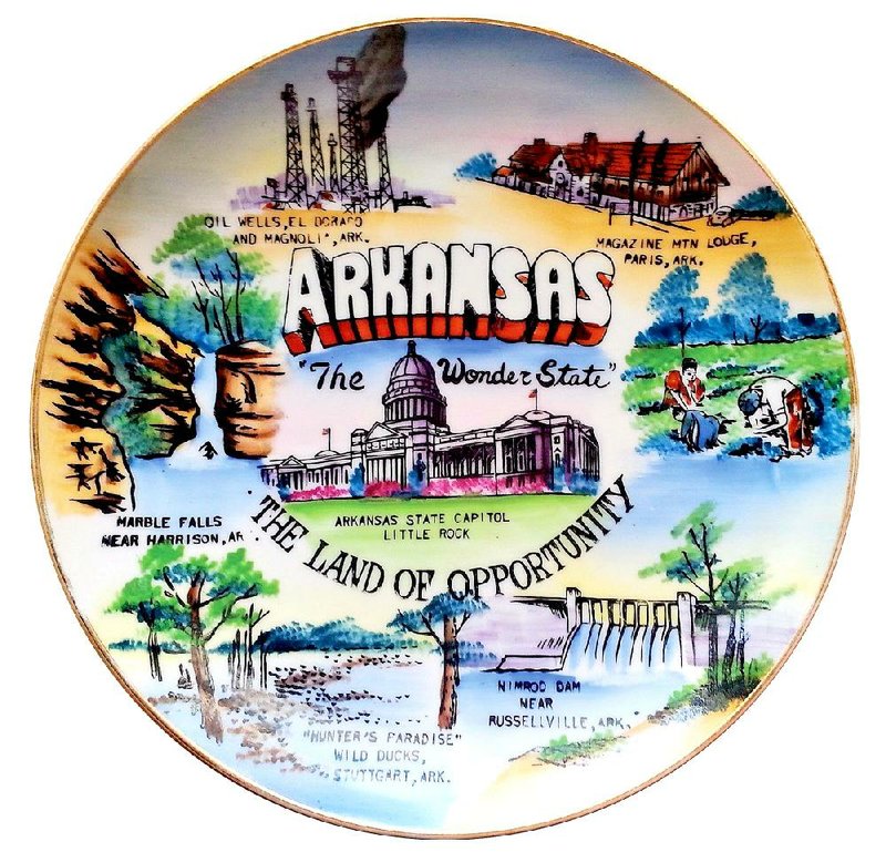 This old souvenir plate remembers Arkansas as “The Wonder State” it was in the 1900s. Things to wonder include what the people on the right are doing in that field of blue — harvesting bluebonnets, the state fl ower of Texas? The plate is from the collection of It’s Official! book designer Jen Hughes, but she wonders, too.