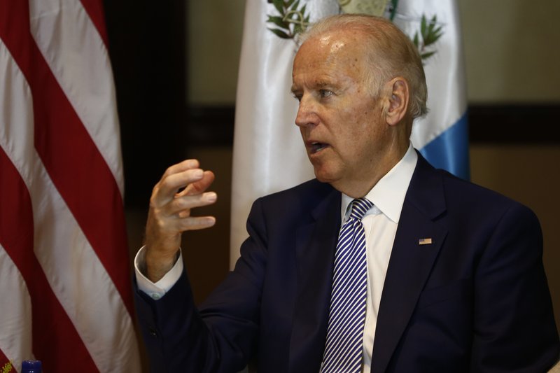 U.S. Vice President Joe Biden, right, speaks during a meeting with Guatemala's president-elect Jimmy Morales in Guatemala City, Thursday, Jan 14, 2016. Biden is on a one day trip to attend Morales' presidential inauguration. (AP Photo/Moises Castillo)
