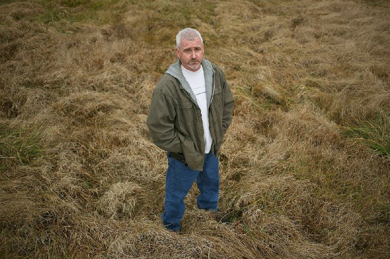 William Merideth stands near his house in Louisville, Ky., where he shot down a drone and set off a legal battle over access to airspace over private property. 