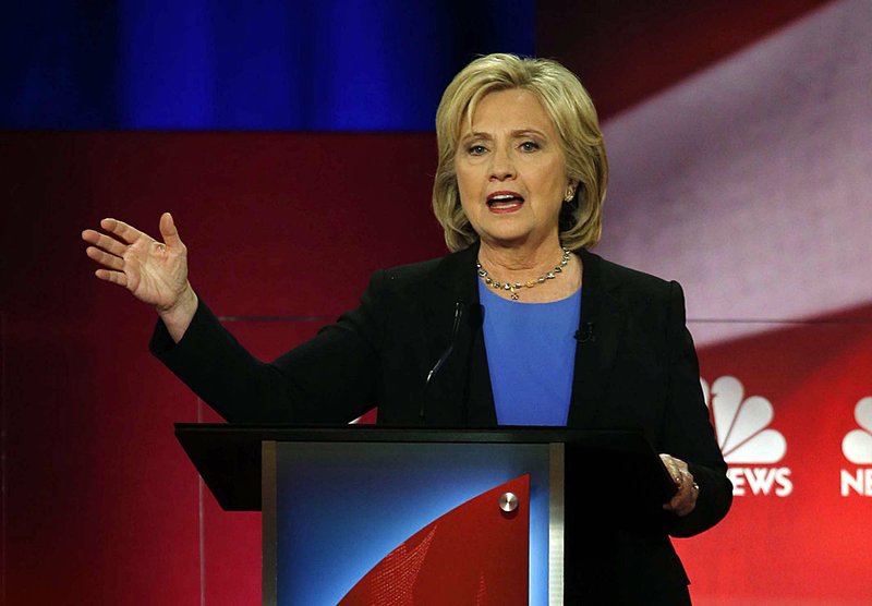 Hillary Clinton TV ads hammer guns in N.H., shy away in Iowa