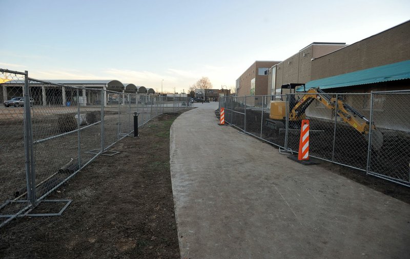 Construction has begun on the new Walter Turnbow Park Thursday in Springdale. The park, located along the Razorback greenway between West Johnson Avenue and East Emma Avenue, will add new green space and creek views for visitors to downtown Springdale. For more photos, go to www.nwadg.com/photos.