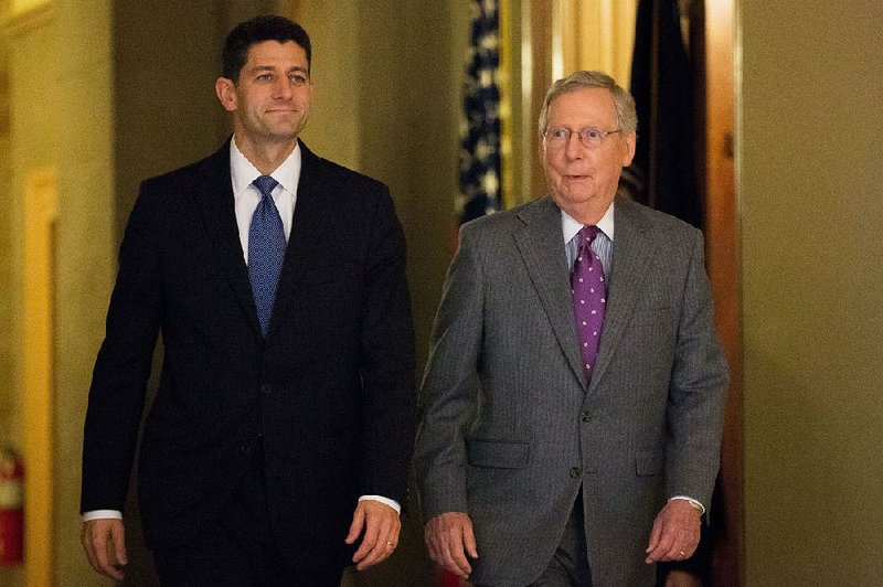House Speaker Paul Ryan and Senate Majority Leader Mitch McConnell meet on Capitol Hill in early November. The Congressional Budget Office said Tuesday that tax cuts and spending increases in the budget passed by Congress in December will help push this year’s budget deficit to $544 billion. 