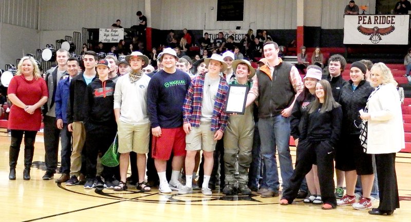 TIMES photograph by Annette Beard State Representatives Sue Scott, District 95, and Rebecca Petty, District 94, congratulated the Blackhawk football team for their &#8220;outstanding performance during the 2015 season.&#8221; The state representatives presented a citation from the 90th General Assembly during half-time of the Blackhawk basketball game Tuesday night.