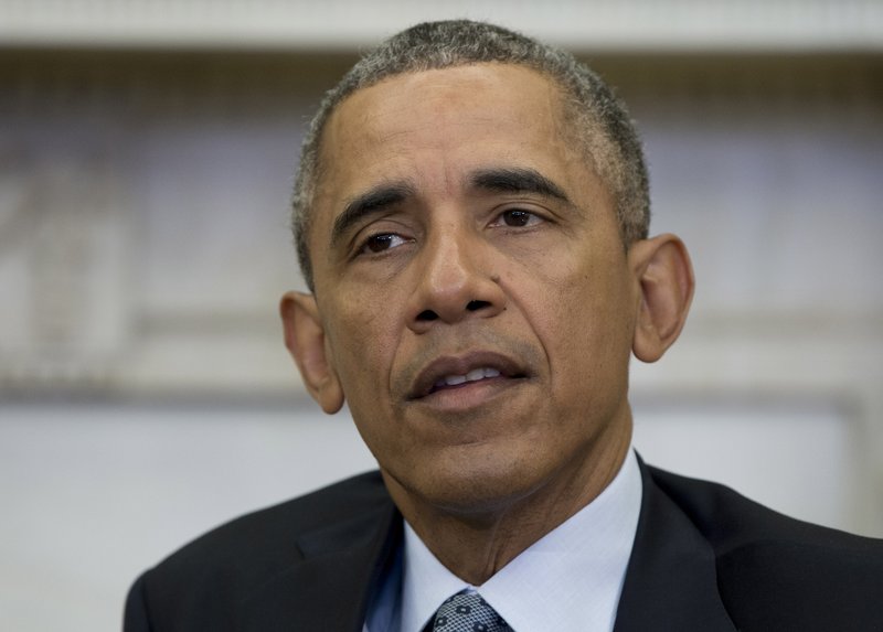 President Barack Obama speaks in the Oval Office of the White House in Washington, Tuesday, Jan. 19, 2016. 