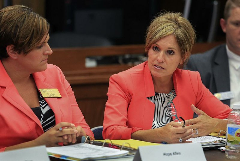 Debbie Jones (right), the Arkansas Department of Education’s assistant commissioner for learning services, is shown in this file photo.