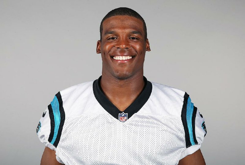 This is a 2014, file photo showing Cam Newton of the Carolina Panthers NFL football team. 