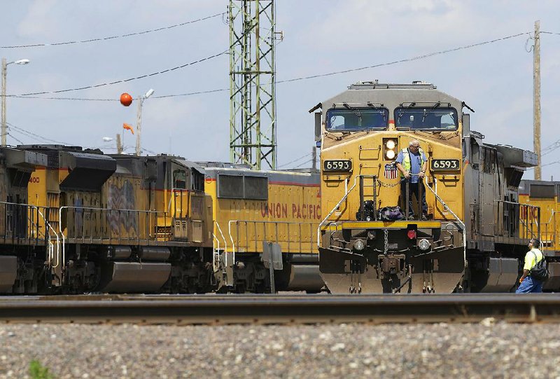 Union Pacific locomotives stand in a yard in Council Bluffs, Iowa, in this file photo. The railroad on Thursday reported a quarterly profit of $1.1 billion. 
